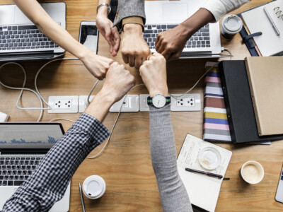 Colleagues giving a fist bump